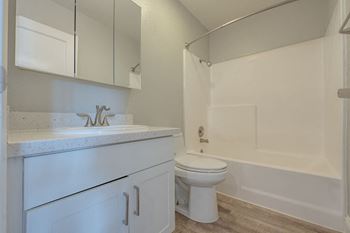 a bathroom with a sink and a toilet at Napa Green Apartments LLC, California